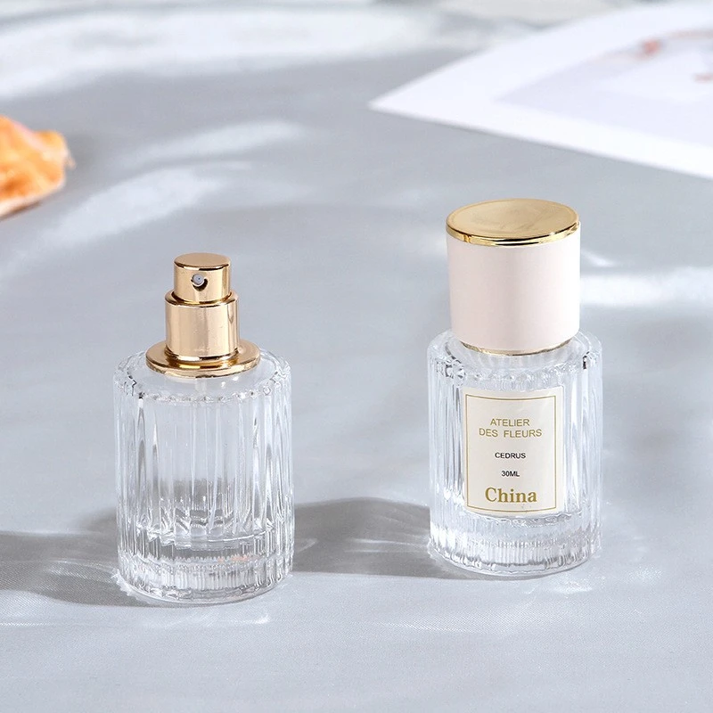 Sunshine High-End 30ml 50ml Cosmetic Packaging Clear Crimping Glass Perfume Bottle With Pump Spray Cap With Sticker